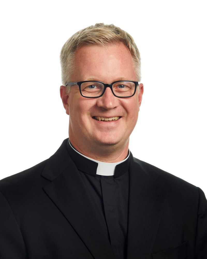Rev. Justin J. Kizewski